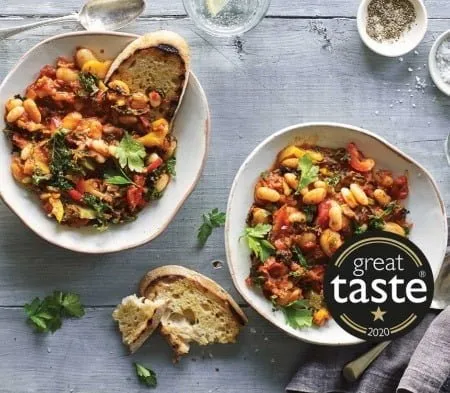 Cook Spanish bean stew